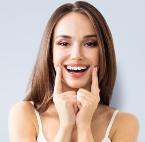 women showing off her perfect smile